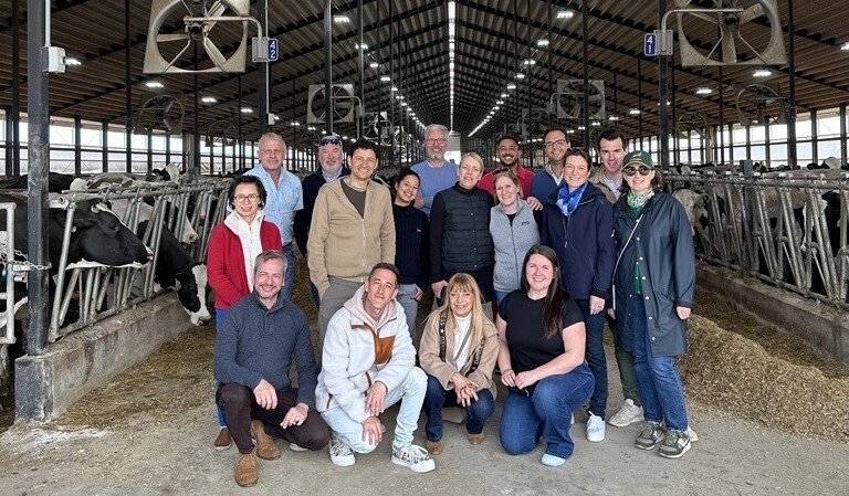 cheese delegation in barn