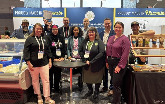 people at a display booth