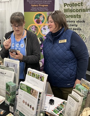 Marcia and Konnie working at the Garden Expo
