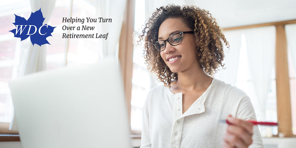 Young black woman looking at her laptop with pen on her left hand; image includes WDC logo with text "Helping You Turn Over a New Retirement Leaf"