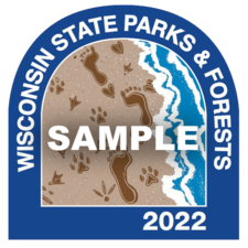 Wisconsin state park sticker illustration with human and animal footprints in the sand next to water