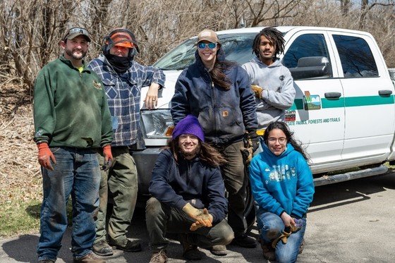 DNR staff and Conservation Academy Crew Members work at Military Ridge State Trail in April 2022