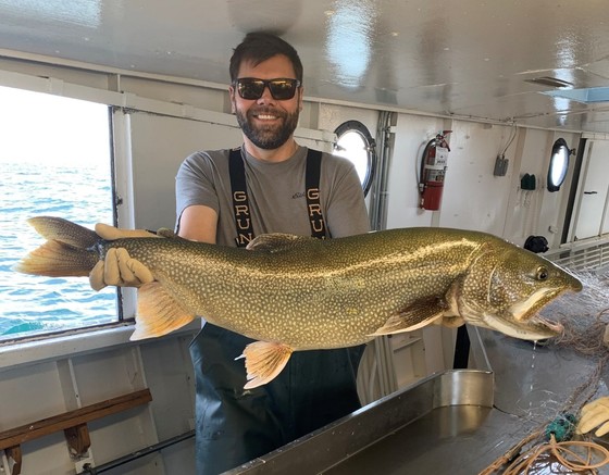 R/V Hack Noyes Captain Ross Lind with an impressive laker during a standard Lake Superior fishery survey in 2022. 