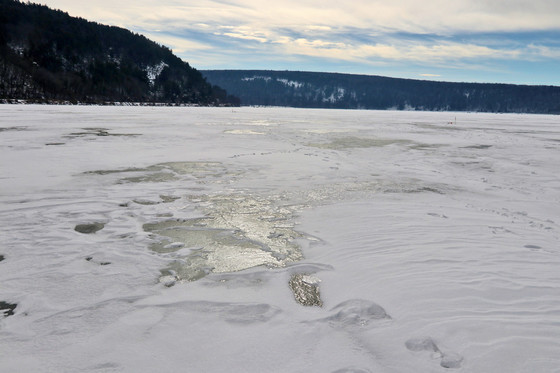 A view of patchy ice and snow covering Devil?s Lake.