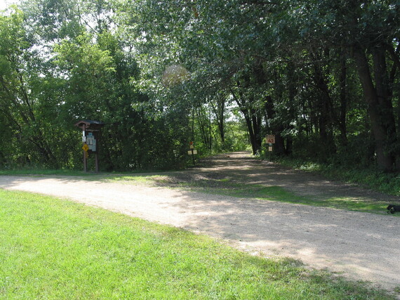 Intersection of two trails, a kiosk and trails