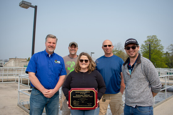 Sec. Adam Payne outside with the staff of the Sheboygan Regional Wastewater Treatment Facility