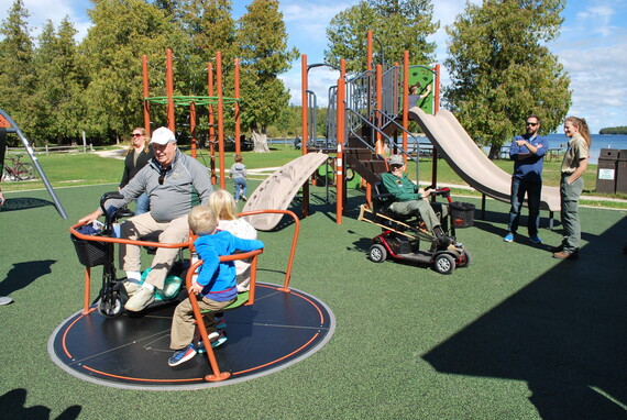 Playground with a young person and an older person