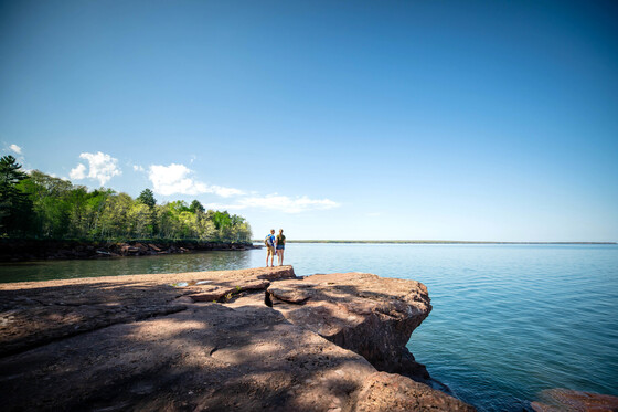 couple enjoying looking at water at big bay state park