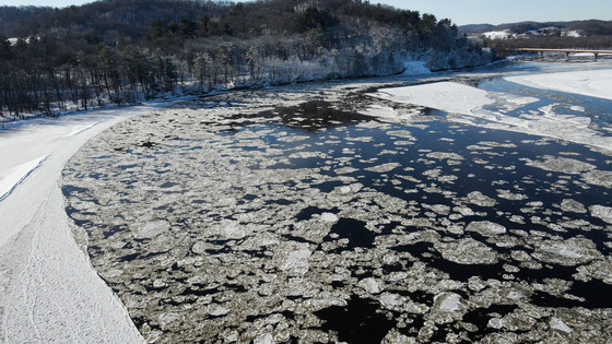 chunks of ice floating in a waterbody