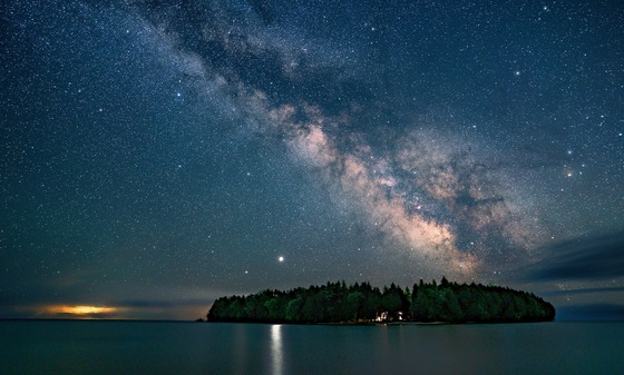 The Milky Way shines in the night sky over Baileys Harbor, Wisconsin. 