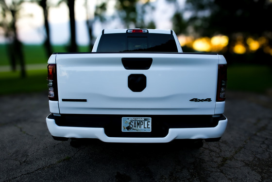 a white pickup truck with eagle Endangered Resources license plate