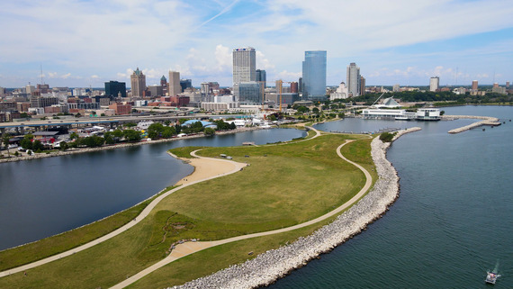 Park with a lake and city in the background