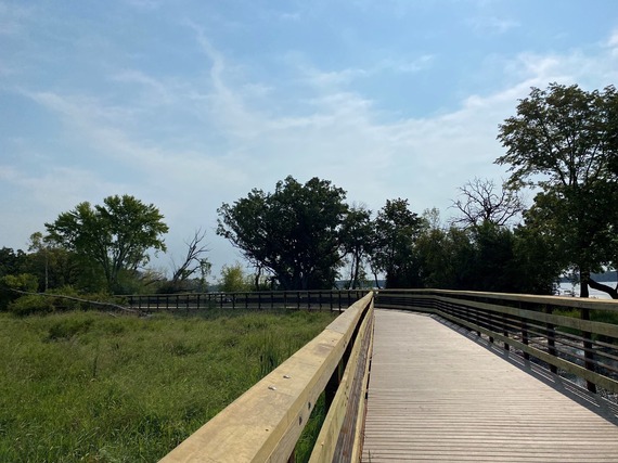 Boardwalk bike trail along a lake