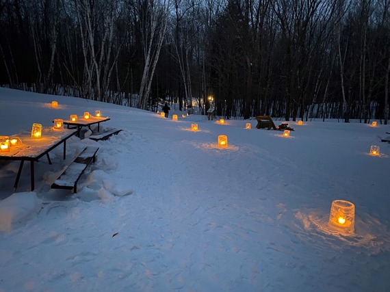 Nighttime forest with candlelights