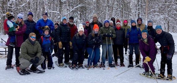 People gathered in snow for photo