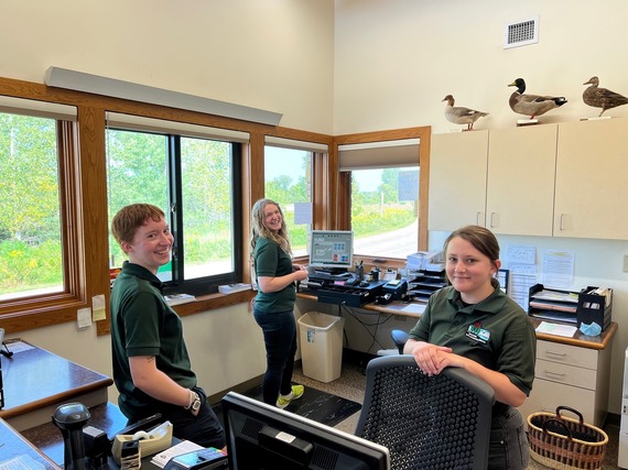 Three DNR Staff in entrance station