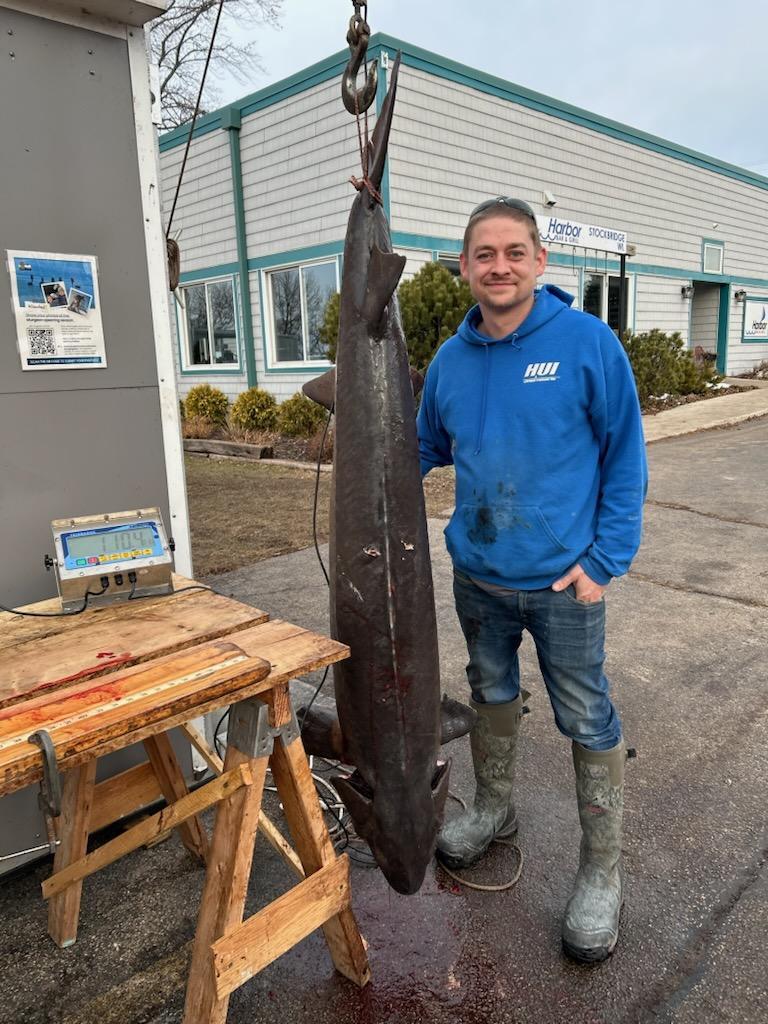 Jaguer Schisel with his sturgeon. 