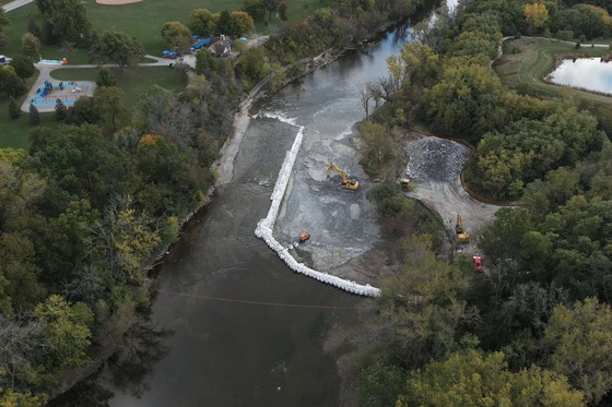Aerial view of construction work to lower ledge at Estabrook Falls on the Milwaukee River