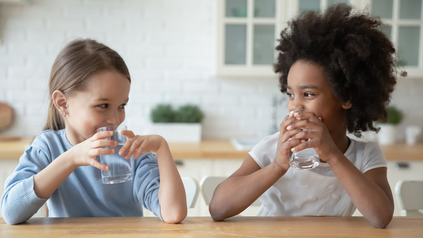 Young girls drink water
