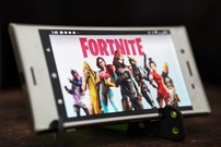Phone screen with characters from Fortnite