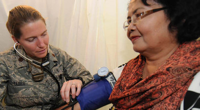 Army-doctor-and-woman check up for Heart month