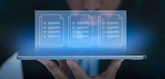 man holding digital dashboard display of document images