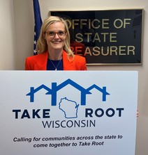 Treasurer Godlewski with Take Root Wisconsin Sign