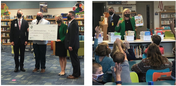 Treasurer Godlewski visits Emerson Elementary in La Crosse and delivers library aid check