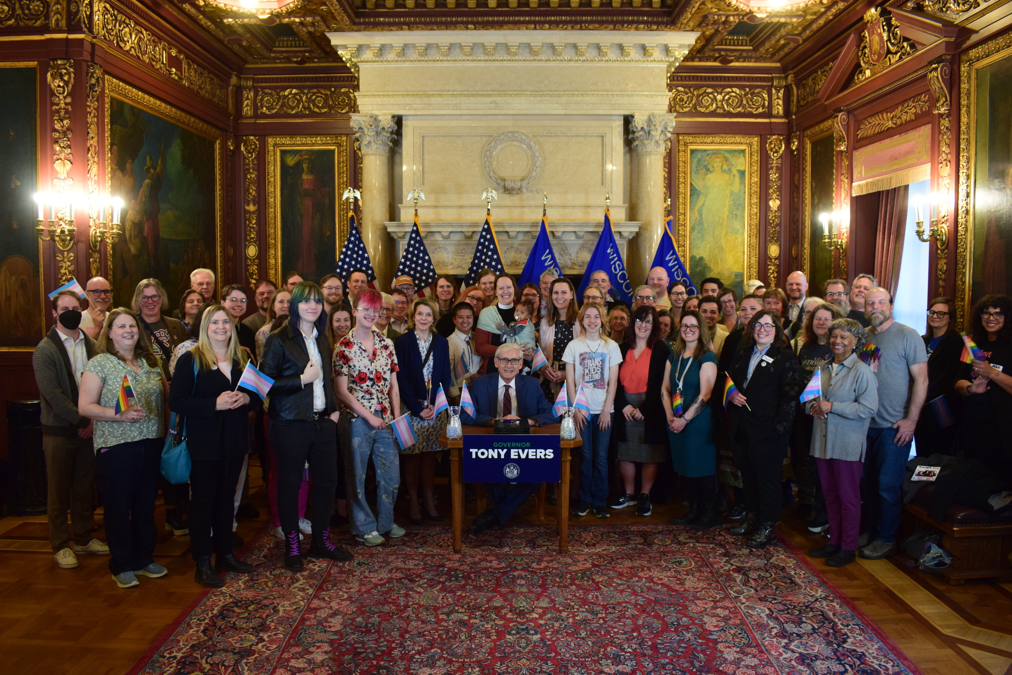 Gov. Evers poses for a photo after vetoing bills with stakeholders in the Governor's Conference Room. 