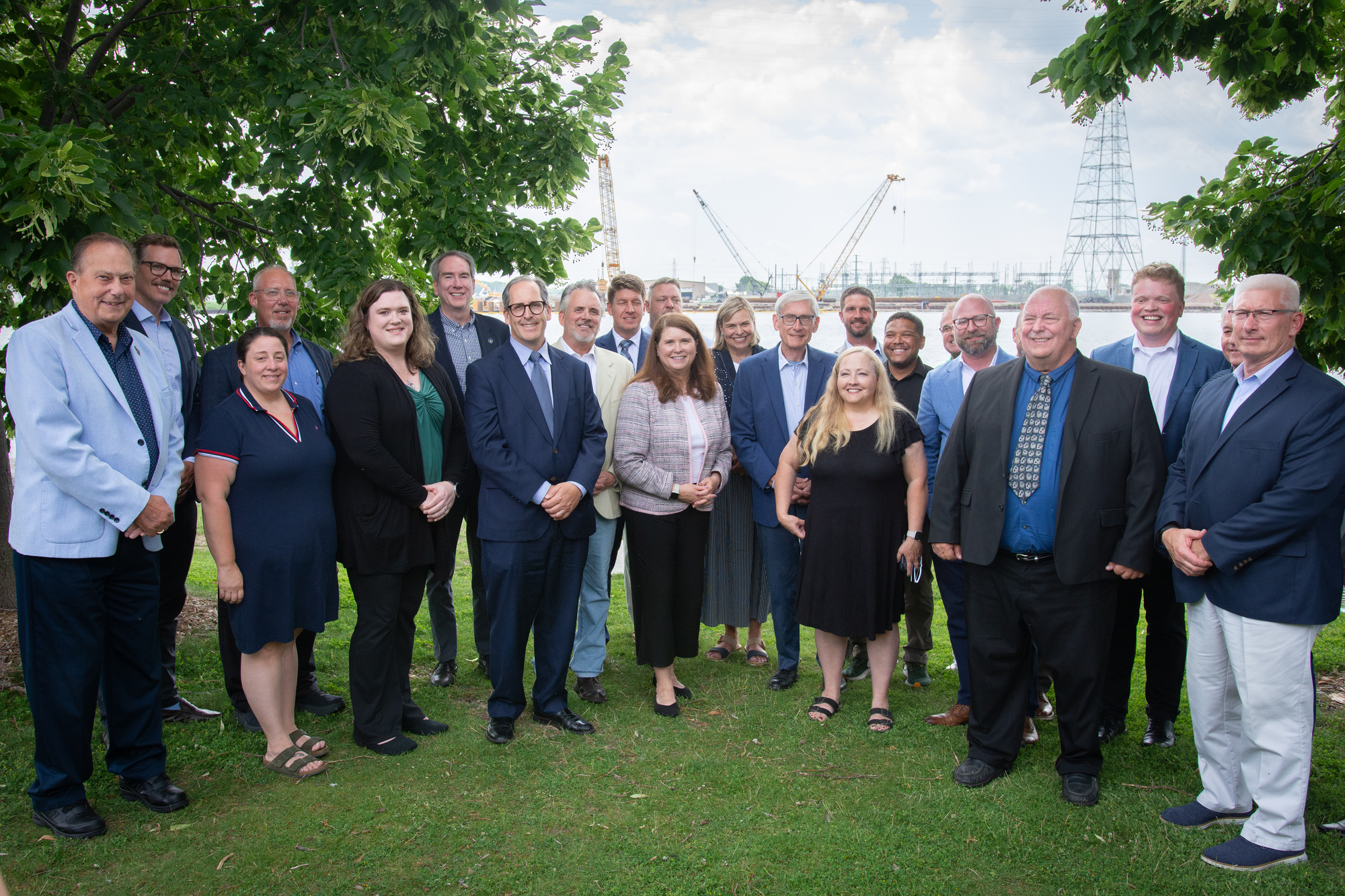 Gov. Evers joins state, county, local, and C. Reiss company officials to celebrate the relocation of coal piles in Green Bay. 