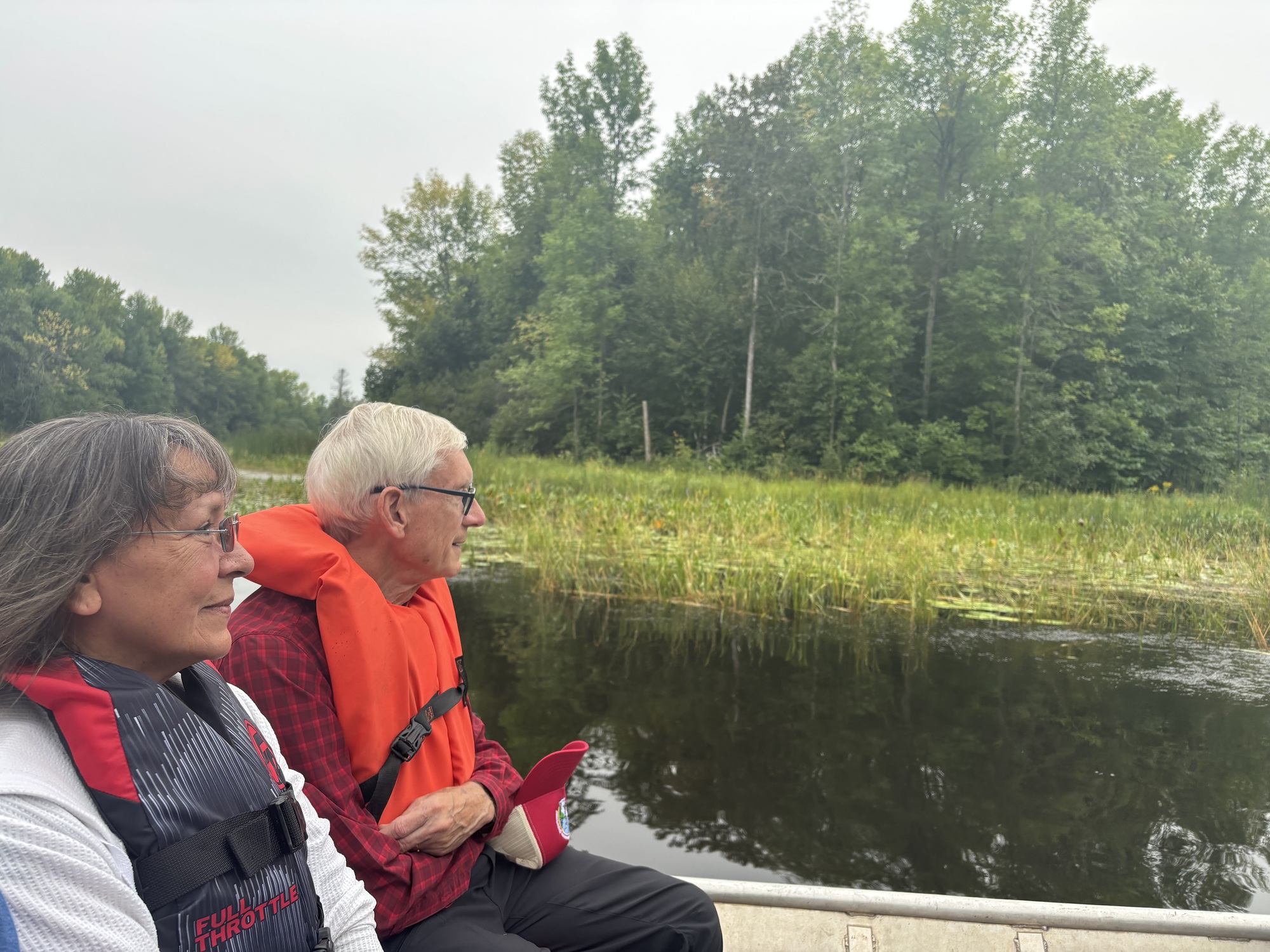 Gov. Evers tours wild rice with Tribal leader in Kakagon Sloughs.