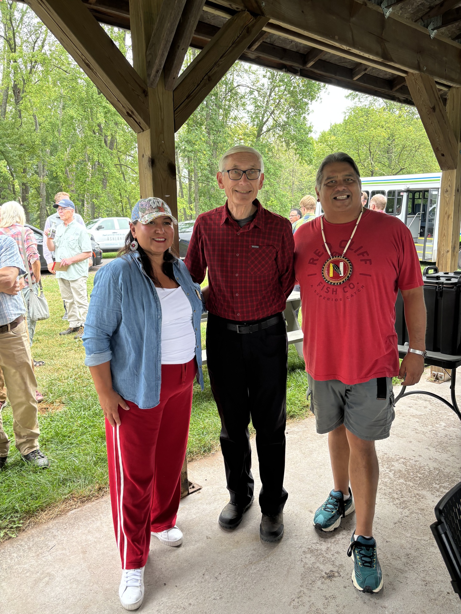 Gov. Evers poses for a photo with Tribal leaders. 