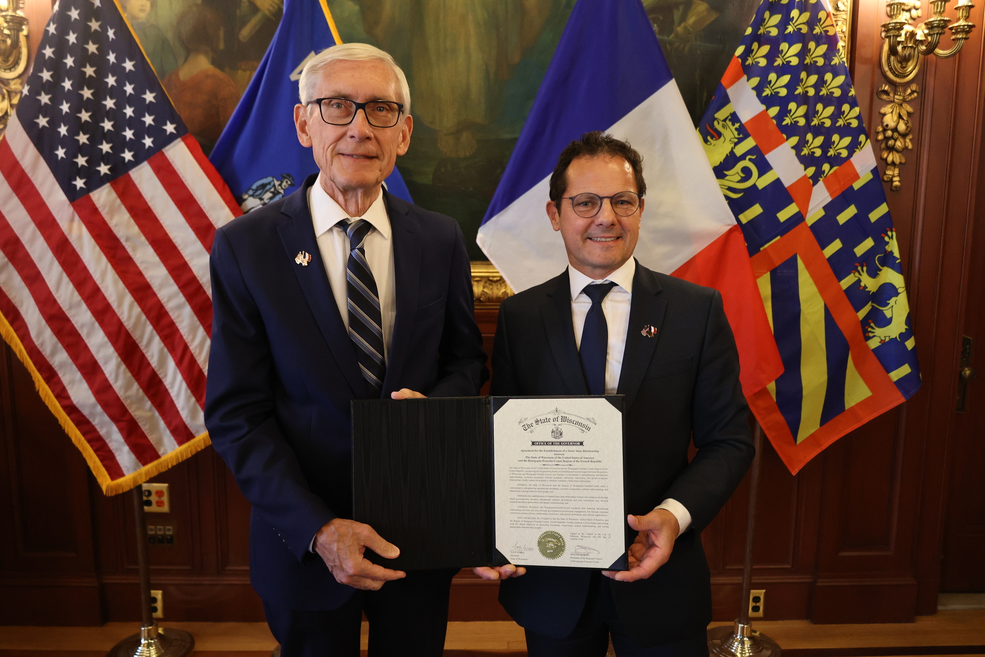 Gov. Evers and President Durain sign MOU to establish a sister-state relationship between Wisconsin and the BFC region in France.