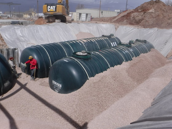 Storage tanks being installed at a gas station in Laramie, Wyoming.