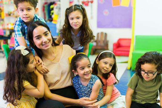 Preschool teacher with kids