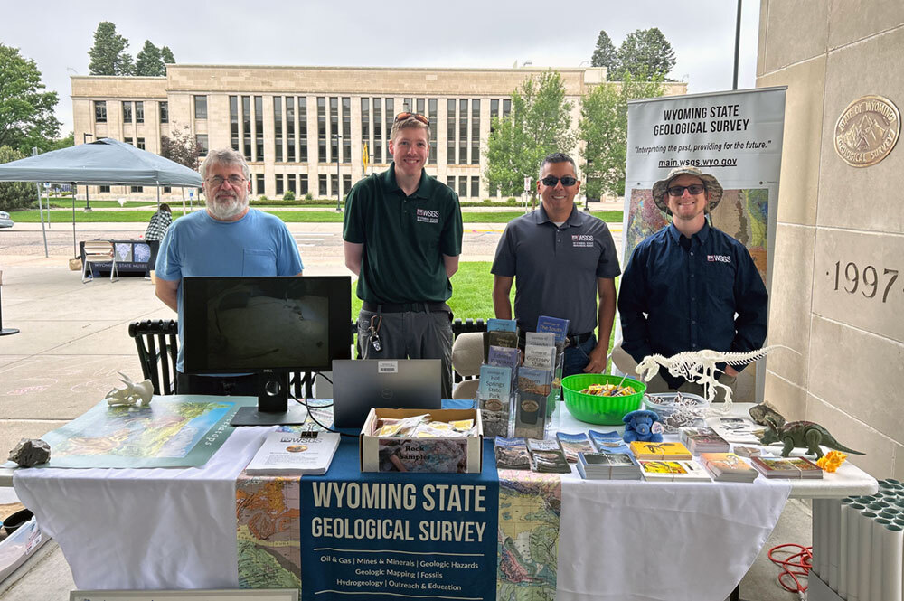 WSGS geoscientists James Rodgers, Colby Schwaderer, Raul Ochoa, and Collin Jensen ready to discuss dinosaurs.