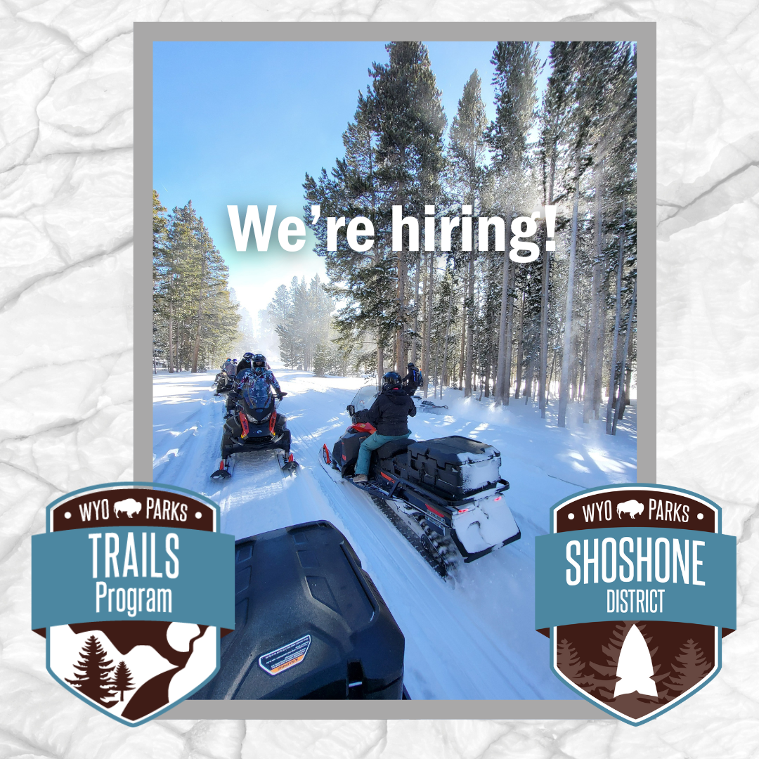 snowmobiling picture with shoshone district and trails logos saying 
