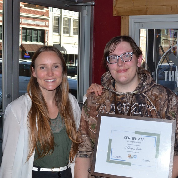 Volunteer of the Year Katey Parris on left with certificate