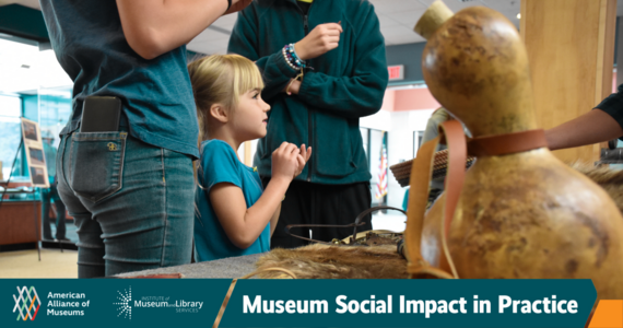 child looking at booth, museum's social impact study