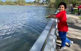 Kid fishing at Sloan's 