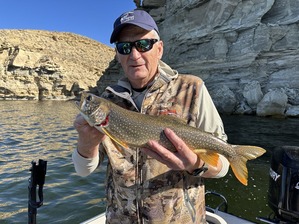 Angler holding catch from Flaming Gorge Reservoir