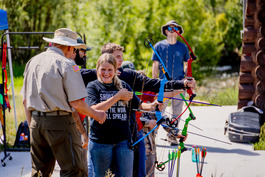 Volunteer hunter education instructor teaching students