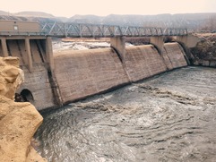 Water flows through a dam system on the Shoshone River.