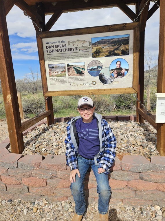 Kid visiting the Dan Speas fish hatchery